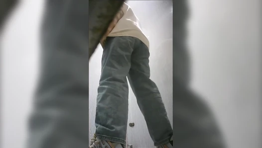 Handheld side-shot of a beautiful woman using the toilet (3)
