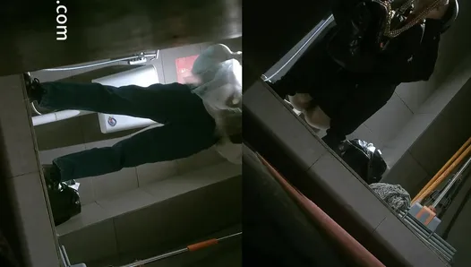 Voyeur front view in women’s restroom of Chinese malatang shop